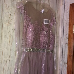 Prom dress worn twice by the girl I bought it from and me. Taupe on the tag